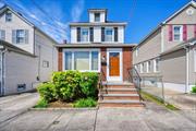 Discover the charm of this inviting Colonial, perfectly positioned in the mid-block area of Floral Park. Just waiting for you to make it your own. On the first floor, there is an oversized living room with high ceilings and a sun-filled skylight that flows perfectly into a full dining room and a spacious eat-in kitchen with an inviting breakfast nook. The upstairs has three bedrooms and one full bath. Highlights of this home include a very large unfinished basement with ample storage and an outside entrance, wood floors (underneath the carpet), new windows, new kitchen appliances, new water heater, new AC units, and a washer/dryer. The spacious, pretty yard features a one-car detached garage and a driveway that can accommodate parking for four cars. Conveniently located near public transportation on Jericho Turnpike and close to the Floral Park LIRR station. Highly sought-after School District 26. Welcome home!