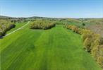 If you cherish country living, this idyllic setting is the perfect property to build a retreat. This offering is 100+ acres consisting of a fine mixture of productive agricultural land, woodlands and an attractive building site offering a wonderful view of the countryside. Surrounded by large farms and land in conservation, the rural landscape is vast and protected.