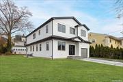 A newly built 6 BR 4.5 Bath Colonial in a very desirable area in Woodmere.. Over 3600 Sq Ft of living space, Kosher eat in kitchen, White Shaker kitchen made by Fabuwood, quartz countertops, double fridge, 2 ovens, 2 dishwashers, Built with 2x6 framing which gives you better R value, also built with Poured foundation and steel columns and steel girder .5 Inch Red oak floor t/o home. 9ft height on 1st and 2nd Floors, Andersen 400 Windows Double doors, high hats in soffits, 200 amps, 4 inch LED lights, spray foam insulation, all bathrooms have radiant heat, Primary Suite has free standing tub, stand up shower 10X10, double vanity, Solid wood doors t/o. 2nds Subpanel on floor, Poured cement in window well, Basement which is addtl 1600 Sq Ft will have 2 egress windows in basement and insulated by R15.. Beautiful area ... close to LIRR, shopping, and multiple homes of worship.