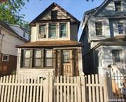 Legal 2 family detached house. 2 bed 1 bath over 2 bed 1 bath on a quiet block. Great Location! Close to Highway, shopping , buses. Minutes to JFK, . Beautiful Tree lined streets No access to interior. FORECLOSURE Being sold occupied & As-Is. Priced accordingly.