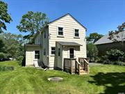 Welcome to the heart of the North Fork in desirable Mattituck! This 3br/1.5 bath two story home sits on a 0.12 acre sq ft lot. Features a newer roof, newer windows/blinds, newer furnace, newer back deck, wood floors. The front porch and other rustic details add to its charm and character. Ready for its new owner to add whatever touches needed to make it their own! Plenty of space in back yard for a pool. Close to town, park, school, wineries, shops and transportation. Offered as an As Is sale. Seller motivated!