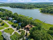 Craft unforgettable moments in this charming waterfront residence. With easy access to Peconic Bay from your own dock, enjoy your Summers inviting friends and family for a scenic boat ride to nearby towns of Southold, Greenport and Shelter Island. Featuring 5 bedrooms and 2.5 baths, this home is situated on 1.09 acres with 105 feet of serene waterfront vistas. First level includes a cozy living room with stone fireplace, dining room, eat-in kitchen, bedroom/den, half bath, laundry room and sunroom. Upstairs you&rsquo;ll find the primary bedroom with ensuite bath, alongside 3 additional bedrooms and another full bath. Step outside onto the spacious back deck to enjoy picturesque views. Ample storage in the oversized 2-car garage . Close proximity to North Fork beaches, wineries and farmstands.