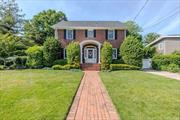 Wantagh Woods All brick stately center hall Georgian Colonial. Approx 3500 sqft. 6 large bedrooms and 2.5 baths. Don&rsquo;t miss your chance to live in the epitome of elegance and charm. This enchanting home sits on 3 lots totaling over 16k sqft (115x141). Entering this spacious home you are greeted by a stunning time-captured foyer and staircase with 9ft ceilings on both first and second floors. The entire home has been updated and is move in ready. Banquet size living and dining rooms with custom fireplace and hardwood flooring throughout. Brand new roof and CAC. Updated eat in kitchen with large pantry and French doors that lead to a spacious deck. Updated baths and windows. Cozy main level family room. Full finished basement with access to the huge park size fenced in yard. Don&rsquo;t miss the large custom built finished great room ready for year round entertaining. The Hot-tub is a gift as well as the custom window treatments . Professionally landscaped with Sprinkler system. Multi level decking and patio space. No Flood Ins needed! Taxes have been grieved.