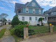 4 bed 2 bath spacious colonial  home with a walk up attic on almost 12, 000 sqf lot
