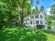 Charming Turn of The Century Villager! Ef, Living Room w/Fireplace, Formal Dining Room, Eat in Kitchen w/Granite Counters & Stainless Appliances, Master Bedroom Ensuite. 2nd Floor; 2 Bedrooms, Full Bath, Walk Up to Finished Attic w/Fireplace. Full Finished Basement w/Walk Out.