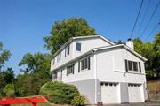 Welcome to 85 King George Road in Spackenkill! This elegant center hall Colonial features four bedrooms and two and a half baths. The spacious, updated kitchen boasts beautiful granite countertops, a peninsula, and elegant cabinetry. It includes a sliding glass door leading to a charming screened porch and a French door opening to a fabulous family room with a red brick fireplace. The upper level boasts a large ensuite bedroom with a full renovated bath and a walk-in closet, along with three additional bedrooms and another full bath. A powder room and laundry area are conveniently located on the main floor. The back deck offers ample space for outdoor entertaining, overlooking a private backyard where you can relax and enjoy the sounds of nature. Move right in and savor all the Hudson Valley has to offer!