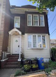 Maspeth detached two family with shared driveway and detached 2-car garage. Total of 5 bedrooms and 3 full baths and full finished basement. 18 x 50 building size on a 25 x 100 lot.