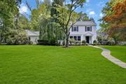 Elegance in Edgemont. Welcome to your own oasis with an abundance of character, sunlight and exceptional space on Bittersweet Lane. A unique location in Edgemont, a private street with only 2 homes, set on a level .68 acre property. This spacious colonial truly has it all: 4 bedrooms with flexible space for a 5th bedroom on the main level; sun-filled rooms; and a large kitchen open to the spacious family room. Stainless steel appliances, granite countertops and a large granite island are perfect for all gatherings. The open concept provides a wonderful flow throughout this home for entertaining indoors and out. Special features include: New roof (2021), New chimney (2021), New siding (2022), freshly painted exterior (2022), new privacy fence, new water heater (2024), 2 patios, office/study with fireplace, playroom/music room, breakfast island, large family room, large living room with fireplace, formal dining room, dreamy primary bedroom with en-suite and dressing area, mud room, a charming window seat on the landing and 2 car garage. Enjoy the tranquility and convenience to town, train, school, shops and more. A wonderful place to call home!