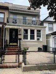 2 family in excellent condition 2.5 baths. First floor and basement delivered vacant. Two bedrooms in each apartment large rooms. Large manicured yard. Walk to Grand Ave shops and transportation.