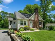 What a gorgeous Cape Cod style home in a desired area! Flavor of yesteryear w/modern vibes! This spacious unique home features gleaming hardwood flooring thru out. 4 bedrooms w/2 full baths provide room for everyone. Plenty of entertaining space w/formal dining room and a huge deck off of the kitchen. Deck is private and has access to a wonderful fenced in over-sized backyard! Home has been lovingly maintained w/newer roof and mechanicals. There is a whole house WAVE system that provides entire house ventilation. Parking for 4 or more cars and a full basement for convenient storage. Did I mention the wood burning fireplace for chilly evenings? This lovely home has it all! Come see it today and fall in love with it&rsquo;s charming character! This will not linger...