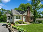 What a gorgeous Cape Cod style home in a desired area! Flavor of yesteryear w/modern vibes! This spacious unique home features gleaming hardwood flooring thru out. 4 bedrooms w/2 full baths provide room for everyone. Plenty of entertaining space w/formal dining room and a huge deck off of the kitchen. Deck is private and has access to a wonderful fenced in over-sized backyard! Home has been lovingly maintained w/newer roof and mechanicals. There is a whole house WAVE system that provides entire house ventilation. Parking for 4 or more cars and a full basement for convenient storage. Did I mention the wood burning fireplace for chilly evenings? This lovely home has it all! Come see it today and fall in love with it&rsquo;s charming character! Newly priced to move...be in for the holiday season!