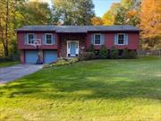 LAKE LIVING...2300 sq. ft. 3 Bed 2 Bath with a big backyard in the Tomahawk Lake community of Blooming Grove, NY. This home has a remodeled Kitchen, A big Living room/ Dining area, A nice sized finished walkout basement, Deck and a 2 car garage. New Bedroom and LL carpet, the rest is 1 year old....New flooring in Kitchen and Laundry room....You have deeded rights to utilize the Lake and attend events or have events of your own. The Lake association has parties throughout the year for both Kids and Adults and is a great place to Swim, Boat, Ice Skate, Lay on the beach, play ball in the rec area or hang out under the pavillion and stare at the water. There are also Basketball courts, Pickle Ball and a Volleyball court as well. Please ask your realtor to take you to the Main beach and the Point.