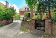 Modern elegance and thoughtful design, creating a haven in the heart of Forest Hills Gardens. Nestled in the prestigious community of Forest Hills Gardens, this exquisite residence stands proudly on a generous 53 x 100 lot. Crafted from solid brick, the 5-bedroom, 2.55-bath home boasts designer finishes and solid white oak floors throughout. The heart of the home is the custom dual tone kitchen adorned with high-end appliances and waterfall quartz countertops, seamlessly connecting to a formal dining room featuring a whitewashed wood-burning fireplace. Convenience meets luxury with a strategically placed laundry room on the second level. The primary bedroom, crowned with cathedral ceilings, offers a spa-like en-suite, complete with a soaking tub, water closet and radiant heated floors. A designated walk-in closet provides both functionality and style. 4 additional bedrooms is also situated on the upper level. Spiral stairs will lead into a bonus room with skylights perfect as a work from home or guest room. An intelligently designed basement with added ceilings height and an open layout works well as an entertainment/playroom. Step outside into your private backyard oasis, an idyllic setting perfect for gatherings. Strategically position for a lifestyle enriched by the vibrant neighborhood with easy access to transportation, express trains and LIRR. The Nature Trails in Forest Park offers amazing hikes. Close distance to supermarkets, movie theater, restaurants and shops. Zoned for PS101 in the Gardens. Enjoy the charm of this quaint neighborhood with the convenience of a short commute to Manhattan. Seize the opportunity to own a residence that harmonizes modern luxury with the timeless appeal of Forest Hills Gardens.