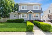 This charming Colonial home offers historic charm and modern convenience. Situated on an oversized 80 x 112 plot, it features three bedrooms, two full baths, and a versatile 1st floor den/bedroom. The bright and airy interior includes a living room, dining room, and well-appointed kitchen. Additional features are a full walk-up attic, full basement, and a 2 1/2 car garage. The fenced-in yard ensures privacy, and the location is ideal for commuters, being close to the railroad. Don&rsquo;t miss this opportunity to own a piece of history with modern comforts.