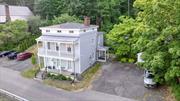 Step into the charm and versatility of this historic gem, now transformed into a commercial multi-purpose haven. Nestled atop a serene hill overlooking the Rondout Creek, this stately building boasts a fusion of elegance and functionality. Upon entry, be greeted by an abundance of natural light streaming through the large windows, creating an inviting atmosphere throughout. The ambiance is further enhanced by the warmth of gas-insert fireplaces, adding a touch of coziness to the space. Formerly owner-occupied by an accounting firm, this property has been meticulously renovated to accommodate a myriad of potential uses. The lower floor is currently rented out, providing a steady income stream, while the second floor awaits its next venture. With a partially finished third floor offering ample storage space, the possibilities are boundless. Enjoy the convenience of a full bath, two half baths, and a kitchenette, catering to the needs of diverse businesses or tenants. Embrace the outdoor serenity on the front porch or second-floor balcony, both offering views of the bustling Rondout Creek and the historic train bridge, creating an idyllic setting for relaxation or inspiration. With commercial zoning in place, the flexibility of this property knows no bounds. Whether it&rsquo;s reverting back to its residential roots, establishing a live-work environment, or cultivating a creative studio space, the potential is limited only by your imagination. Seize this opportunity to own a piece of history and embark on a journey of endless possibilities in the heart of this vibrant community. Don&rsquo;t miss your chance to make this extraordinary property your own. Additional Information: HeatingFuel:Oil Above Ground, ParkingFeatures:1 Car Detached,