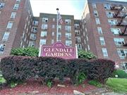 Immaculate 2 bedroom unit in Glendale Gardens in Westchester County. Spacious and sunny with a beautiful, modern kitchen with stainless steel appliances including gas range/oven, microwave, dishwasher and refrigerator. Both the kitchen and bathrooms are beautifully tiled and updated. Entry leads into an open dining room and a bright living room with a large window. Plenty of closet space with 2 double closets in the primary bedroom and large closets in the entry hall. Sparkling hardwood floors and nothing to do but move in! This well-maintained and well-managed complex has a live-in superintendent, a porter, an updated onsite laundry room, an indoor garage and a parking lot. It is close to Metro North station, 2 and 5 train, bee line buses and major highways. Commute to Grand Central station can be less than 30 minutes! Across from shopping center that includes a pharmacy, coffee shop and restaurants. This is an incredible find! Board Approval Required.