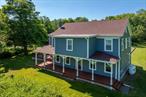 Stately 6-bed, 3 ba 1850&rsquo;s farmhouse on 2 park-like acres meticulously renovated. Blends historic details-you cannot reproduce today-w/ modern updates. Owner currently boasts duplex living. Sprawling 1st fl flows seamlessly: foyer, kitchen, DR, LR, 3 beds, 2 baths. +Bonus of 3 lge rooms on 2nd fl, now workspace/ visiting guest quarters, have endless possibilities. Main fl windows flood space w/ light-doors lead to a grand rocking chair porch. Attached Heated garage for your skis! Portion of the 2nd Fl, w/ Pvt entrance, currently set up as separate living qtrs: kitchen, DR, LR, 2 beds, bath. Tenant pays all utilities. While the rental income helps off-set expenses, w/ minimal effort-could easily be turned back into the single-family grand farmhouse it once was or Mother/ Daughter w/ magnificent hallway w/ interior stairway. Many upgrades. Eateries/ Hot Spots min away;15 min Hudson, Ski Windham; near HITS Saugerties, Woodstock; NYC 2.5 hrs. One-of-a-Kind Property-your family staycation!