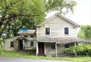 Looking for a lover of history to preserve and rehab this historic structure which was an integral part of Ancram&rsquo;s storied past. The Tinsmith House was built in the 19th century and served as the location of the local tinsmith shop as well as a general store and a residence. The structure sits at the crossroads of Route 82 and County Route 7 in the historic Ancram hamlet. The property requires a total rehab and is not currently habitable. Property is located in the Hamlet Business/Residential zone which offers other possibilities in addition to a residence such as antique store, art gallery, retail store or office. OWNER FINANCING available.