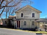 Looking for a lover of history to preserve and rehab this historic structure which was an integral part of Ancram&rsquo;s storied past. The Tinsmith House was built in the 19th century and served as the location of the local tinsmith shop as well as a general store and a residence. The structure sits at the crossroads of Route 82 and County Route 7 in the historic Ancram hamlet. The property requires a total rehab and is not currently habitable. Property is located in the Hamlet Business/Residential zone which offers other possibilities in addition to a residence such as antique store, art gallery, retail store or office. OWNER FINANCING available. Additional Information: HeatingFuel:Oil Above Ground, Appliances: Electric Water Heater