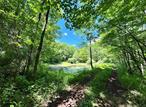 Extraordinary 10 acres with multiple building sites and a brand new road in, bringing you right up to the beautiful private ponds edge to get you started. With multiple brooks and creeks running throughout the side and front corner portion, this property pretty much has it all when looking for a parcel with lovely variety! Old Growth pine and many deciduous tree species, this is an estate just waiting to happen! Bordering an additional 10 acres (One Key MLS H6309143) also with its own private pond, one could make this a family compound, where siblings grow up with the fondest memories of fishing and swimming, and hiking throughout the forest with their friends and cousins! Or simply make it your very own dream Catskills getaway, for I am in love with its potential and I think you will be too! Airbnb&rsquo;s allowed so come and make it yours today - I will be happy to show you around and convey my ideas. On an absolutely beautiful stretch of Dahlia Road between Liberty and trendy Livingston Manor, you will have everything at your fingertips, and all of it, a short drive away, in either direction! Dahlia is a highway quality road with surprisingly very little traffic. These lots are also wonderful for simply pitching a tent and camping with your loved ones, until you are ready to build! A visionary&rsquo;s dream! A must see! Both lots have new roads in, so pull in your camper today and start living your best life now!!!