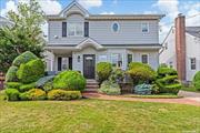 Welcome to this classic center hall colonial with an open concept layout, large kosher eik with breakfast room, den, 4 large bedrooms upstairs, partially finished basement, 2 zone central air, large rear year, low taxes.