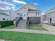 Welcome to your waterfront oasis in Lindenhurst! This charming 3-bedroom, 2-bathroom home boasts not one, but two spacious living areas spread across the first and second floors, ensuring ample space for relaxation and entertainment. Sunlight dances through every corner of the open-concept layout, accentuating the modern finishes and creating an inviting atmosphere throughout. Step outside onto the patio, where you&rsquo;ll be greeted by the soothing sounds of the water just steps away. This tranquil outdoor space is perfect for morning coffees, or simply basking in the serenity of waterfront living. Upstairs, a balcony awaits, offering panoramic views of the shimmering waters, perfect for enjoying breathtaking sunsets or a quiet moment of reflection. This home is the epitome of Long Island living! Do not miss the opportunity to make it yours