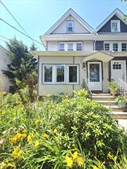 Five bedroom three bathroom Ozone Park colonial on a DOUBLE lot just a block from the train. This property has parking galore and tons of interior space. On the first floor you will find an open concept living and dining room leading into a beautifully renovated chef&rsquo;s kitchen. Wood floors are a mix of ornate parquet and gorgeous bamboo. Second level has three well appointed bedrooms and a full bathroom. Third level has a full bathroom, flex living room space, and an oversized bedroom. Full finished basement with a cellar door that can easily house an outside separate entrance, laundry, a third full bathroom, and multi-purpose bed/room. Kitchen area has a sink, cabinetry, and capped off gas. The most gorgeous curated flower garden awaits you outside. Absolute tranquility sitting on your rear deck admiring a hidden beauty tucked away just one block from shopping, transportation, and more.**Two separate tax lots  Lot: 29 & 30** Vacant Lot is Lot:30  ZONING: R4A . This oversized property won&rsquo;t last.