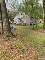 Come finish the renovation! Cabin at Mohican Lake was partially stripped with the intention of a cosmetic upgrade which was never completed. A 3-season, 3 B/R, 1/2 bath + sep. shower room with washer and dryer. 4yr old septic tank and well is less than 15 yrs old. Each B/R fits a queen size bed+. Great room with Kitchen, D/R, & L/R with beautiful lake view. Pull down stairs to wide open stand-up attic with plenty of potential! Back deck out to yard with firepit and woods beyond. Privacy! Front deck with beautiful view of the lake. Enjoy swimming, boating, kayaking, paddleboarding, fishing and more! Less than 500 ft from the Association boat launch and picnic area. Membership is optional, but membership is only $100/year! Hunting on nearby state lands. Several rod and gun clubs in the area as well. Less than 20 mi from skiing and snowboarding, Bethel Woods Center for the Performing Arts, Forestburg Playhouse, and the Delaware River Come enjoy!