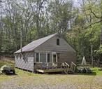 3 BR, Cabin at Mohican Lake in Glen Spey, Sullivan County. Mohican Lake is a beautiful lake with motorboating allowed! Cabin is a 3 season, 3 B/R, 1/2 bath plus separate shower room with washer and dryer. Each B/R fits a queen size bed. (the 2nd B/R in the picture has a queen bed sideways, plus a twin bed and double dresser!). Great room with Kitchen, D/R, & L/R with beautiful lake view. Pull down stairs to wide open stand-up attic with plenty of potential! Back deck out to yard and woods. Front deck with view to the lake. Enjoy swimming, boating, kayaking, SUP, fishing and more. Back yard with fire pit and woods beyond. Privacy! A short walk to the Association boat launch and picnic area. Membership is optional, but membership is only $100/ year! Hunting in nearby state lands. Several rod and gun clubs in the area. Less than 20 mi from skiing and snowboarding, Bethel Woods Center for the Performing Arts, Forestburg Playhouse, and the Delaware River Come enjoy!