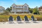 Discover luxury waterfront living at 218 Dune Road, Westhampton Beach. This stunning bayfront coastal oasis offers unparalleled elegance and comfort throughout 4, 000 sf of living space. The traditional style architecture spans across 2 stories offering 5 bedrooms, including both a first floor and second floor primary suite, 5 full baths and 1 half-bath. The open and bright interior features a gourmet eat-In kitchen with top-of-the-line appliances, living room with cozy fireplace, family room, and den/office. Each room showcases the spectacular vistas with walls of windows and sliding glass doors leading to decks and balconies. Outdoors, enjoy breathtaking bay views, direct bay access, the in-ground, heated pool, hot tub, and an expansive entertainment-ready deck surrounded by water views. Ample driveway parking plus 3 garage spaces and plenty of storage. Located between the bridges, this property also includes beach access. Come to 218 Dune Road where every day feels like a vacation., Additional information: Appearance:Excellent, Interior Features:Lr/Dr