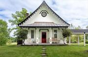 Experience the charm of Rhinebeck, NY, in this historic country retreat which is geared toward a healthy living lifestyle. Originally a schoolhouse designed by the famed architect Alexander Jackson Davis in 1842, this home offers 2, 016 sq. ft. of living space with central air conditioning and includes 3 bedrooms and 3 bathrooms, all on 1.44 lush acres. Enjoy the scenic views of stunning meadows as far as the eye can see from the well-manicured grounds. Step into a foyer leading to a living room with a fireplace, a formal dining room, and a chef&rsquo;s kitchen open to a light-filled family room, all meticulously restored with original features preserved. Seasonal Rental option $15, 000/month.  The first-floor bedroom boasts a spa-like bathroom and features an organic mattress and bedding ensuring a restful and rejuvenating sleep. Upstairs, find the master bedroom and another bedroom, two full bathrooms, and a convertible home office, all furnished with eco-friendly materials, organic mattresses and bedding throughout. Outside, a patio leads to a detached 2-car garage with an attached light filled artist&rsquo;s studio, currently a media room, offering a peaceful space for creativity and relaxation. This retreat is minutes away from Amtrak, the Hudson river, shops, restaurants, a 4- star rated spa by Forbes travel , the Performing Arts Center, and the Fairgrounds, allowing you to enjoy the best of the Hudson Valley year-round or seasonally. Biking and hiking abound. Immerse yourself in a lifestyle of wellness and tranquility in this exceptional home.