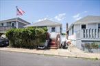 The Perfect Beach House Awaits You In The West End Of Long Beach!! This Home Has 3 Bedrooms, New Kitchen With Quartz Counters, New Full Bath, Paved Backyard, Private Front Porch, Tons of Storage, Full Basement, 6YO Roof, And Stand-Up Attic. Ready To Move Right In!! Enjoy Year Round Living Or Just For The Season. One Block Off The Beach & Close To The Fabulous Shops, Parks & Restaurants. Enjoy All Long Beach Has To Offer Right Outside Your New Home! This One Will Not Last!!