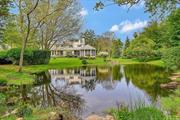 Cutchogue--Cedar Road. Exquisite natural setting featuring lovely pond with waterfall and golf course views. 1+ acres private setting with pond and specimen plantings. Charming, screened gazebo is perfect for summer shade and outdoor dining, sited with views of the expansive property. This gracious 2-bedroom, 2 full bath home features a living room with fireplace and hardwood floors. Formal dining room with sliders to the rear deck; large kitchen with stainless appliances, wolf range and hood, tumbled tile backsplash that continues over all counters, and granite counter tops in addition to radiant heat. Large breakfast nook. Great room with vaulted ceiling and sliders to the back deck. Fabulous views from the house and deck of the pond and rear of the property. All rooms are bright, and light filled. 1st floor full bath/laundry room. Second floor: 2 large bedrooms, full bath, and office area. Additionally, there is an outbuilding with potential for an artist, writer or other creative studio. The Bunkhouse, which was moved from its original Mattituck/Laurel site at Camp Immaculata, could also serve as a separate office space.  Easy access to Cutchogue and New Suffolk Park District beaches, golf, boating, wineries, restaurants. The true North Fork experience. If a beautiful, private, park-like setting is something you would treasure, this home and property is a MUST SEE.