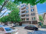 Rarely found 2 bed, 2 bath, over 1350sf corner unit with 66sf balcony in downtown Flushing. Newly renovated kitchen with high-end appliances. Walk in Laundry Closet. 10 min walk 7 train, easy access to Q17, 27, 34 and Q25 , one block to PS 24 and SAT Prep. Close to Kissena park and supermarket and all. Low Maintenance. Garage parking, $200.00/month