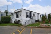 This 1 bedroom trailer in Islip has updated bath, and new upgraded flooring. This park is cash only. 10 foot wide by 40 feet long. Monthly due is 1, 068 which includes taxes, water, sewer, snow removal. Gifts are 2 smart TV, new blinds, and washer/dryer.