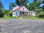 Hobby farm located in the Town of Neversink, set on 3.25 acres of fully fenced level land. Farm house features 4 bedrooms and 3 full bathrooms. First level features covered side porch for entrance into mudroom with entrance into the kitchen which has been updated with granite counter tops along with stainless appliances. Ample counter and cabinet space along with high hats and windows for ample lighting. Small bedroom off the kitchen also featuring hardwood flooring. Large formal dining area off of the kitchen with oak hardwood flooring, full bathroom and second bedroom off of the dining area. Living room, laundry room and a suite bedroom with 2nd full bathroom also on main level with access to the front yard and small covered front porch area. Upstairs features a very large main suite that was built in 2002 featuring large main bathroom with skylights, soaking tub and separate stall shower, hardwood flooring in main suite along with quaint storage areas. Exterior features 3 outbuildings for your animals including 3 paddocks for horses, a garage building for storage of feed and or ATV etc.. Three separate fenced areas for your animals to run, along with a 3rd greenhouse building used for feed and gardens. Never sink is known for its low taxes along with close access to state land for hiking and the Reservoir for fishing. House also has backup whole house generator for just in case.