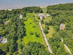 8.42 Acres with LI Sound water frontage and beautiful views. Please reach out to agent for more information regarding building and possible subdivision. Land being sold as is.