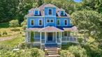 Beautiful circa 1895 Victorian Home! Let the large double front doors welcome you into this 3 story home featuring a lovely front foyer, main level, high ceilings, wood floors throughout, a living room, library w/ plenty of book shelves, pocket doors, formal dining room w/ built-in cabinets, kitchen w/ an island, a half bath & a wonderful sunroom. Charming wide staircase leads to the 2nd floor that hosts a primary bedroom w/ a full bath, 3 additional bedrooms, a den/office & another full bath. Wonderful, original details, wood floors & beautiful woodwork that has been lovingly restored. The 3rd floor has 6 additional rooms that are awaiting your renovation. Plus an attic area & stone foundation, Anderson windows, a 1 car garage & a full house Generac Generator. Over 3, 600 sq. ft. Relax on the wonderful rocking chair porch while you listen to the babbling water of the Lake Jeff waterfall. Located just minutes to Bethel Woods & the hamlet of Jeffersonville for shopping & dining. Additional Information: Amenities:Pedestal Sink,