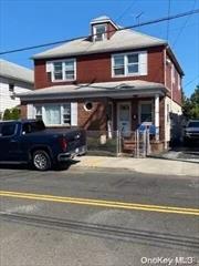 A Lovely Side by Side 2 Family. Located at Border of Village of Lawrence. A Minutes&rsquo; Walk to The Long Island Railroad and Nice Bus Stop. Excellently Maintained. 2 Gas Meters, 3 Electric Meters. 1 Water Meter. Driveway, 40 x 100 Property. Great Back Yard. Located in Nassau County in The Lawrence School District. Unit A: 1st Floor Livingroom, Dining Room, Full Kitchen 1/2 Bath. Washer/Dryer, 2nd Floor 4 Bedrooms, Full Bath.  Unit B: 2nd Floor Full Kitchen/Livingroom Open Floor Plan with Small Den, Full Bath. 2nd Floor 3 Bedrooms.