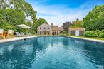 GORGEOUS QUOGUE TRADITIONAL Magnificent 4 BR/5 BA home in the Estate section of Quogue with plenty of living space. Main floor features a grand living room, country kitchen with newly-painted cabinets and indoor/outdoor dining area, formal dining room, family room, and a 1st floor study with pull-out couch. Upstairs: a spacious master suite, junior master suite, and two more tastefully-decorated bedrooms. Outside is a new gunite pool surrounded by lawns and mature landscaping. Great location just off Quogue Street, backing up to the Field Club, minutes from the Quogue beaches. Available for off-season starting August 18!