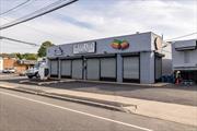 Fantastic opportunity to rent a free standing mixed use building in the heart of Farmingdale. High visibility corner location features 10.500 sq. ft. lot, an additional 640 sq. ft. garage like structure with electric for extra storage. Updates include new walk up window, split heating a/c units. LED lighting throughout. Update 400 amp electric. 2 updated half baths. 3 offices. Storefront on Main St. Loading dock on Frank Ave. Space can easily be converted to two separate businesses. Security system with 21 cameras included. Close to all major parkways. Location! Location! Location!