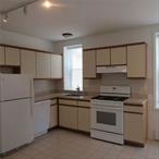 Monthly Rents Reduced on this beautiful, well maintained 1st floor 4 room apartment consisting of EIK w/pantry, family/living room, bedroom and full modern bath. Like new gas range, dishwasher, refridgerator, counter tops & cabinetry. Shared laundry units in basement. Wi-Fi, trash, water and sewer expenses are included in rents. Tenant pays gas and electric (apprx $150 a month). Nothing else to do but move in. Credit scores m/b 650 or higher with incomes above $40, 000. Small pets considered w/pet deposit. A monthly pet fee may be assessed. NO smokers. Location: northside of Poughkeepsie at the corner of Old Orchart Place and Taylor Avenue just off Washington Street. The Walkway over the Hudson, Pulaski Park (pool), medical facilities, shopping, colleges and restaurants are all just a short distance away.