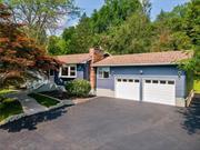 You&rsquo;re going to love the quiet living in this lovely home! It will give you peace of mind, with all new features! New blue siding makes it the most striking home in the neighborhood+ new roof! Stamped concrete walkway & new entry lead you in. Gorgeous kitchen has quartz counters, stylish cabinets, modern lighting, new appliances, pantry and an island with a breakfast bar! The open floor design allows you to easily change around your living space! The living room has a brick fireplace and a Pella Bay window with built in blinds! plus there&rsquo;s a sunken family room with sliders to the beautifully stamped concrete patio & quiet yard! The bathrooms are both tiled in dramatic porcelain with lovely lighting & vanities. The master bedroom has a large cedar closet & a half bath. Downstairs is a wide-open basement ready for your hobbies & projects & 200 Amp electric will give you plenty of juice! The large 2 car garage has new door openers & super high ceiling! Enjoy BBQ on your patio in your own piece of Heaven! Nearby is the Capelli Sports Complex & Glenmere Mansion! Also, close to Legoland, Castle Fun Center, Historic Goshen Trotters Track & museum, wineries, breweries and so much more! Perfect for commuters, just a couple minutes to Rt 17!