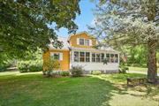 TWO HOMES AT 779 County Route 12, a sprawling 18+ acre expanse of land with two dwellings! The interior of the main residence, a 1, 500 square foot cape cod style home, features four generously sized bedrooms, two bathrooms, eat-in-kitchen and enclosed front porch. This home offers an abundance of space and comfort, including a bedroom and bathroom on the main floor for added convenience. Just a few feet from the main house step inside your three-car garage and workshop, a haven for automotive enthusiasts. This versatile space provides ample room for storage and creative endeavors, allowing you to indulge in your passions without sacrificing convenience. Above the garage, a hidden gem awaits - a separate 1, 200 square foot ranch home boasting three generously sized bedrooms and two bathrooms, with a potential monthly rent estimate of $2, 500! This additional living space presents a lucrative opportunity for generating income. Whether you choose to welcome long-term tenants or welcome family/friends, the possibilities are endless. Both dwellings share a well and septic, while the aspiration of subdividing the land may not be feasible, this property holds tremendous potential as an income-generating investment. With its captivating charm, abundance of space, and income-generating possibilities, this property is truly a rare find. HURRY call today for your private showing!