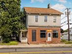 Commercial building in the Village of Wappingers. This building has three units, one restaurant bar and two apartments.... Great investment opportunity.. Parking on side for 3 cars & Drive way in front of building with spaces for 2 cars.