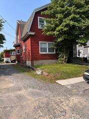 one of a kind , legal 2 family on oversized property 92x105 each apt has 2 bdrms eik bth living rm. great investment opportunity