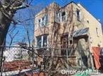 Legal two family house with a massive lot size (40X 138.92) selling As Is. Add an additional 1400 sqft to the building if you like by right. High basement ceilings with a side entrance door for access. Brand new heating furnace. Icing on the cake is a two car garage. Property needs work but has a ton of potential., Additional information: Appearance:Poor, Separate Hotwater Heater:yes