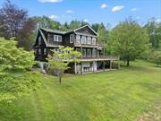 Welcome to 90 Highland Rd, Stone Ridge, NY. This exquisite 3-bedroom, 3-bathroom estate spans 2, 926 square feet with an extra 1, 461 square feet of finished basement space and sits on just under 4 acres. You&rsquo;ll be blown away by the sweeping mountain views from multiple rooms and both decks. The home features stunning dark wide plank hardwood floors and antique terra cotta tile imported from France in the kitchen and dining room. Enjoy radiant subfloor heating in the kitchen, sunroom, and upstairs bathroom. The kitchen is adorned with custom walnut cabinets, marble countertops and a huge window that lets you take in the exceptional view while you cook. The living room boasts cathedral ceilings, built-in bookshelves, and a 25-foot custom stone fireplace. Pella Architect series energy-efficient windows and solid wood doors enhance the home&rsquo;s comfort and efficiency. The property includes a custom mahogany front porch, apple, chestnut, pear, and peach trees in the backyard, an outdoor shower, and a custom curved rectangular gunite pool. The huge finished basement with a fireplace, full bath, bonus bedroom and walkout access to the yard adds to the home&rsquo;s appeal. This property is a rare find in the desirable Stone Ridge area and not to be missed.