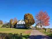 Majestic Grand Lady from days gone past. Started life as a 20 room boarding house & dairy farm & in the 1960&rsquo;s was turned into apartments, 1-2 bdrm, 2 studios, 3- 1 bdrm. Also 9 bedrooms on the third floor but no heat or plumbing. Scenic views abound on the 47+ acre farm with over 30 acres of fertile pasture land, apple orchard, pond potential, 4 wells, springs. Dependable tenants some there almost 20 years. Extra 1.7 acre lot with productive well included. Taxes reflect Star & Agricultural exemptions.