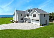 Perfectly poised where South Gillette Avenue ends and The Great South Bay begins, this stunning home welcomes you. Recently undergoing a full renovation and expansion, taking full advantage of the sweeping views of the bay and Fire Island silhouettes. A fresh palette of soft grey exterior, surrounded by emerald green lawn makes this home a standout on one of Bayport&rsquo;s most coveted streets. Enter the foyer and immediately be drawn to the southern water views. The grand living room is an open concept allowing you to conceptualize how YOU want to live. Perhaps a seating arrangement around the fireplace, a large dining area with room for all, and breakfast nook in the kitchen. The stunning kitchen boats Cafe appliances, farmhouse sink and large island with seating. This level includes a den/office with private bathroom, laundry room, powder room and access to the 2-car garage. The second level offers the most impressive primary suite. This room encompasses the entire south wing, with fireplace, vaulted ceiling, exquisite marble bath, walk in closet and a private covered balcony with panoramic water views from sunrise to sunset. Three additional en suite bedrooms, all with private bathrooms complete this level. This home beckons an elegant yet comfortable lifestyle. Beautifully designed and turn key, awaiting its new owners to create a lifetime of memories.